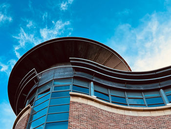 Low angle view of building against blue sky