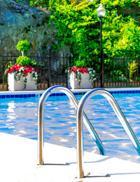 Close-up of swimming pool against blue water