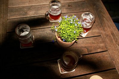 High angle view of beer glasses on table