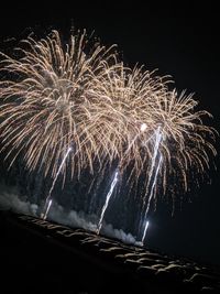 Firework display at night