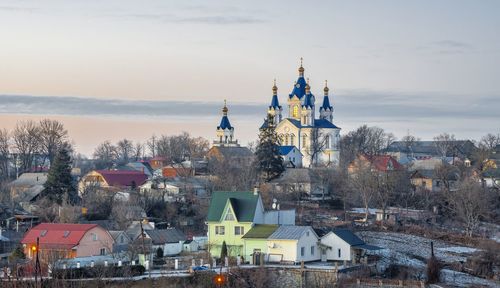 Panoramic view of the kamianets-podilskyi fortress on a winter night