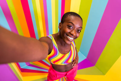 Portrait of young woman standing in gym