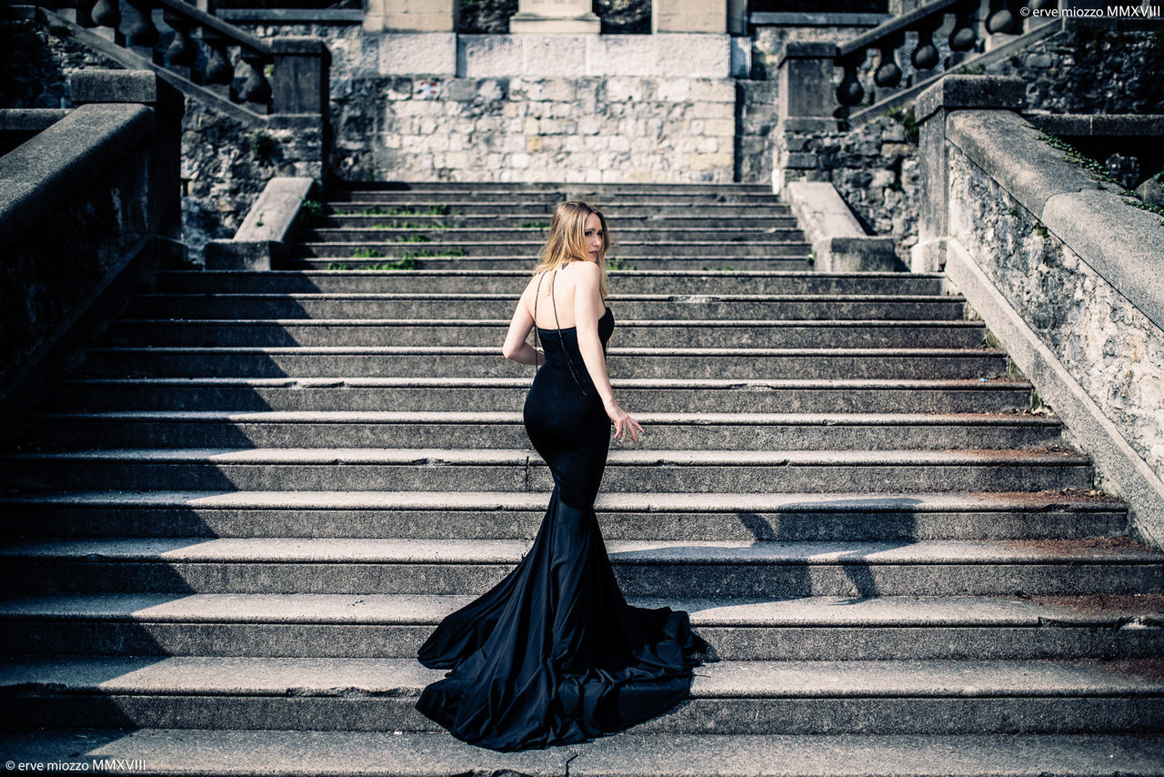 architecture, young adult, one person, staircase, women, clothing, young women, beauty, fashion, full length, adult, steps and staircases, beautiful woman, dress, hair, portrait, formalwear, blond hair, contemplation, hairstyle