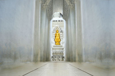 Golden buddha statue sculpture, architecture and symbols of buddhism, at northern thailand.