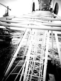 Boats in water against sky