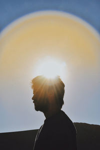 Low angle view of man against sky