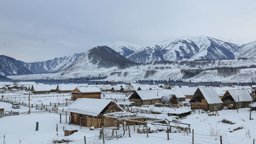 Scenic view of snowcapped mountains against sky