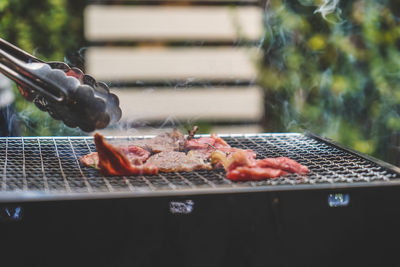 Close-up of meat on barbecue grill