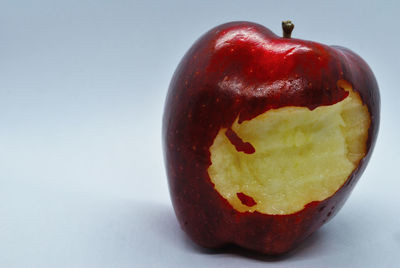 Close-up of apple against white background