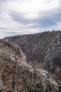 Scenic view of rocky mountains against sky