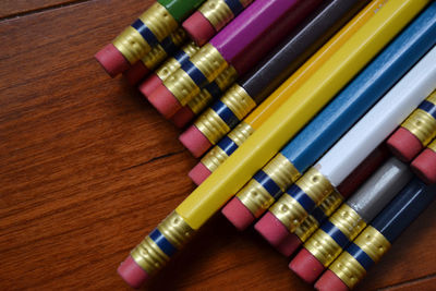 High angle view of multi colored pencils on table