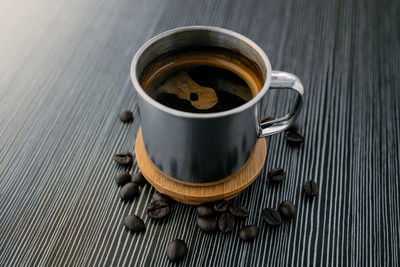 High angle view of coffee cup on table