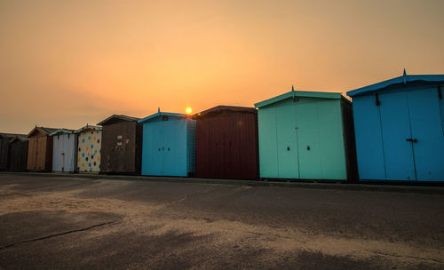 Buildings against sky during sunset