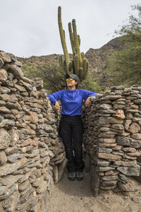 Women exploring ruins, ruins of quilmes in the tucuman province