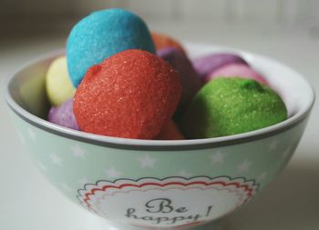 Close-up of colorful marshmallows in bowl on table