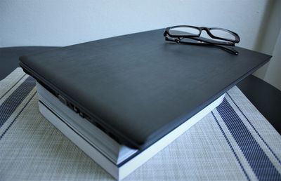 Close-up of eyeglasses on table