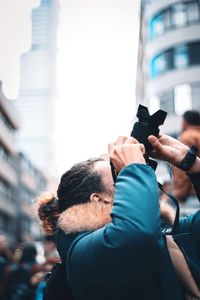 Portrait of man photographing