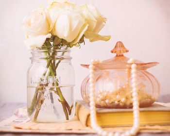 Close-up of glass vase on table