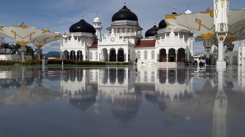 Reflection of buildings in lake