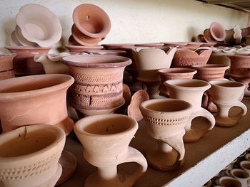 Close-up of earthenware for sale