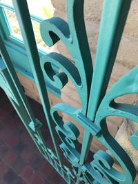 High angle view of metal grate on floor