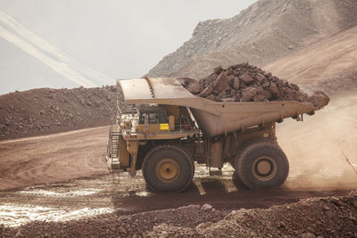 Mining activity, mining dump truck, high angle view of truck working on field