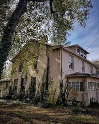 Low angle view of old building against sky