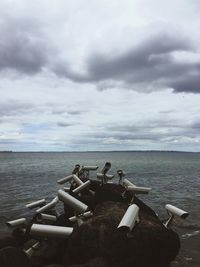 Scenic view of sea against cloudy sky