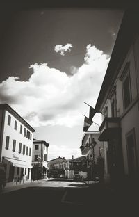 Street in city against sky