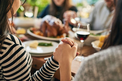 Midsection of woman having food