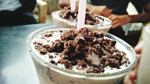 Close-up of ice cream in glass on table