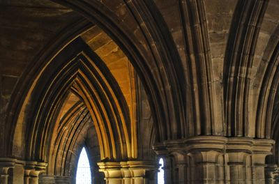 Low angle view of colonnade in building