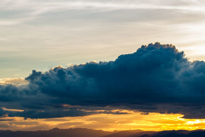 Low angle view of cloudscape against sky during sunset