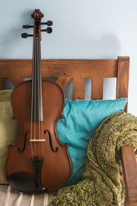 Violin on sofa at home