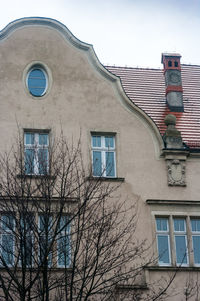 Low angle view of old building against sky