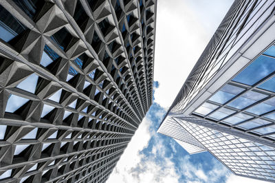 Low angle view of modern buildings against sky