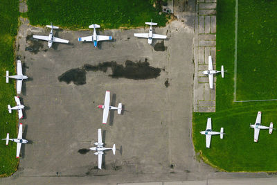 High angle view of airplanes at airport runway