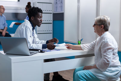 Doctor working in office