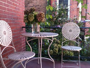 Table and chairs at sidewalk cafe