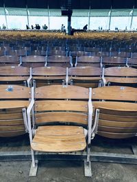 High angle view of empty bench in row