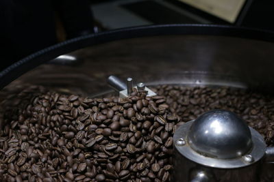 Close-up of coffee beans on table