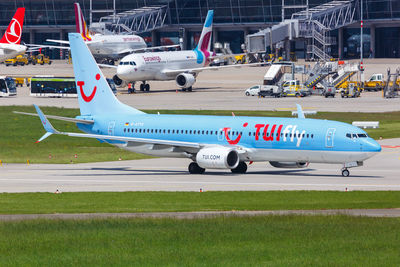 View of airplane at airport runway