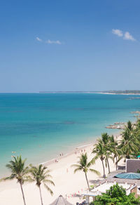 Scenic view of sea against blue sky