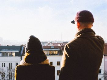 Woman looking at cityscape