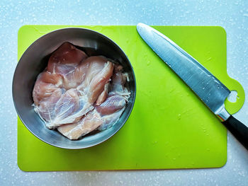 High angle view of bread on cutting board