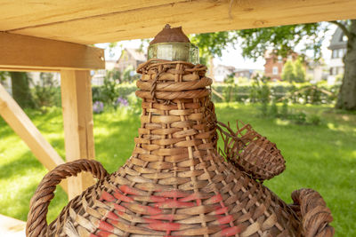 Close-up of wicker basket on tree