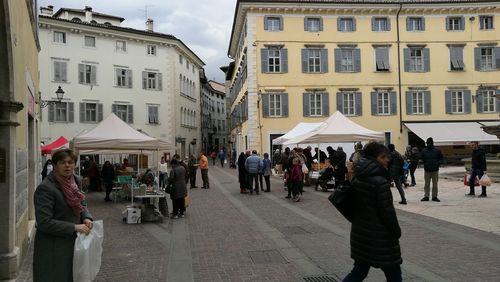 People at street market in city