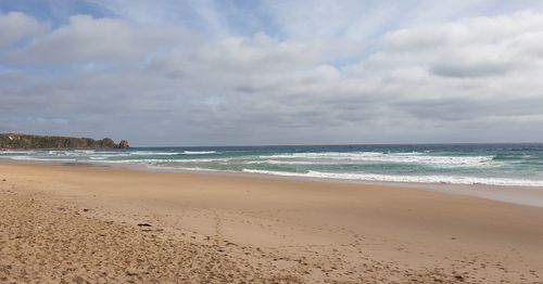 Scenic view of beach against sky