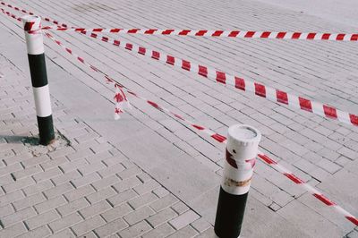 High angle view of people walking on footpath