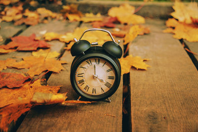 Close-up of clock on table